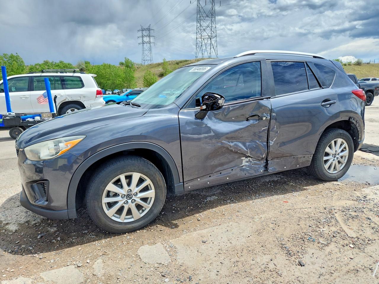 2014 Mazda CX-5 Sport, VIN JM3KE2BE5E0398920 — Side