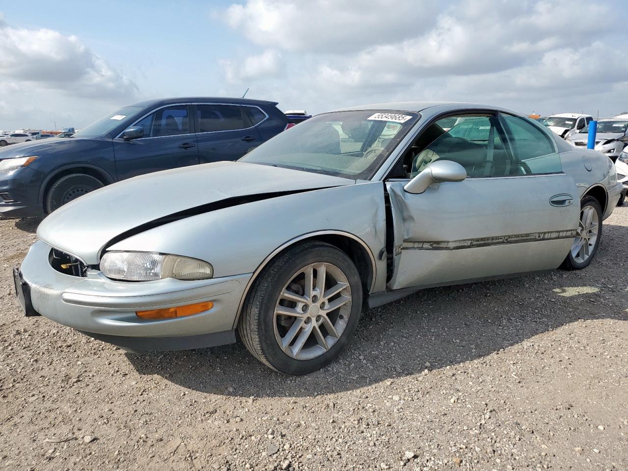 1997 Buick Riviera, VIN 1G4GD22K4V4715131 — Side