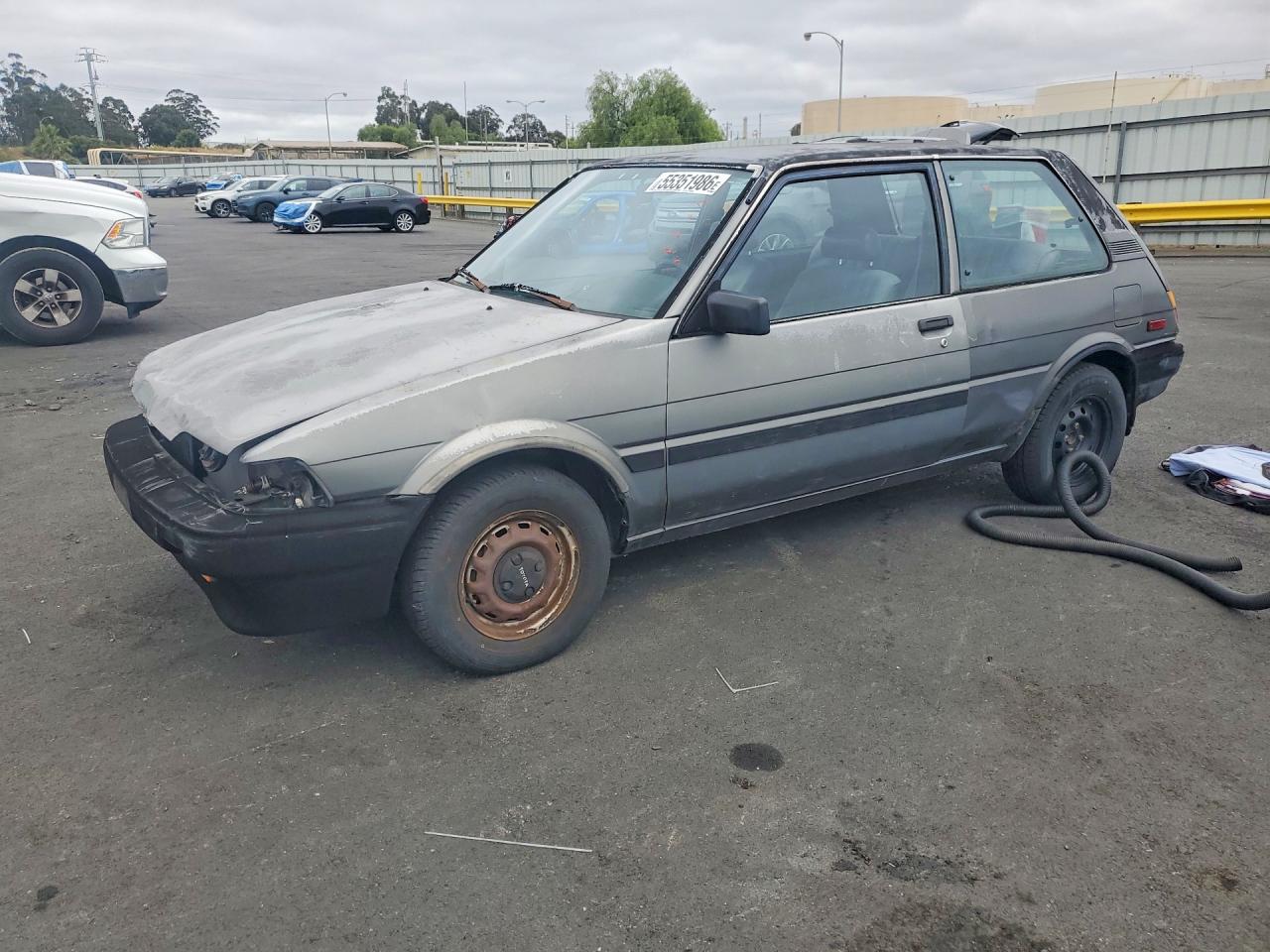 1988 Toyota Corolla, VIN 1NXAE82G4JZ527804 — Front end