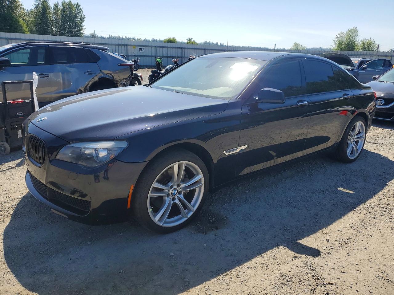 2011 BMW 7 Series 740i, VIN WBAKA4C52BC392093 — Undercarriage