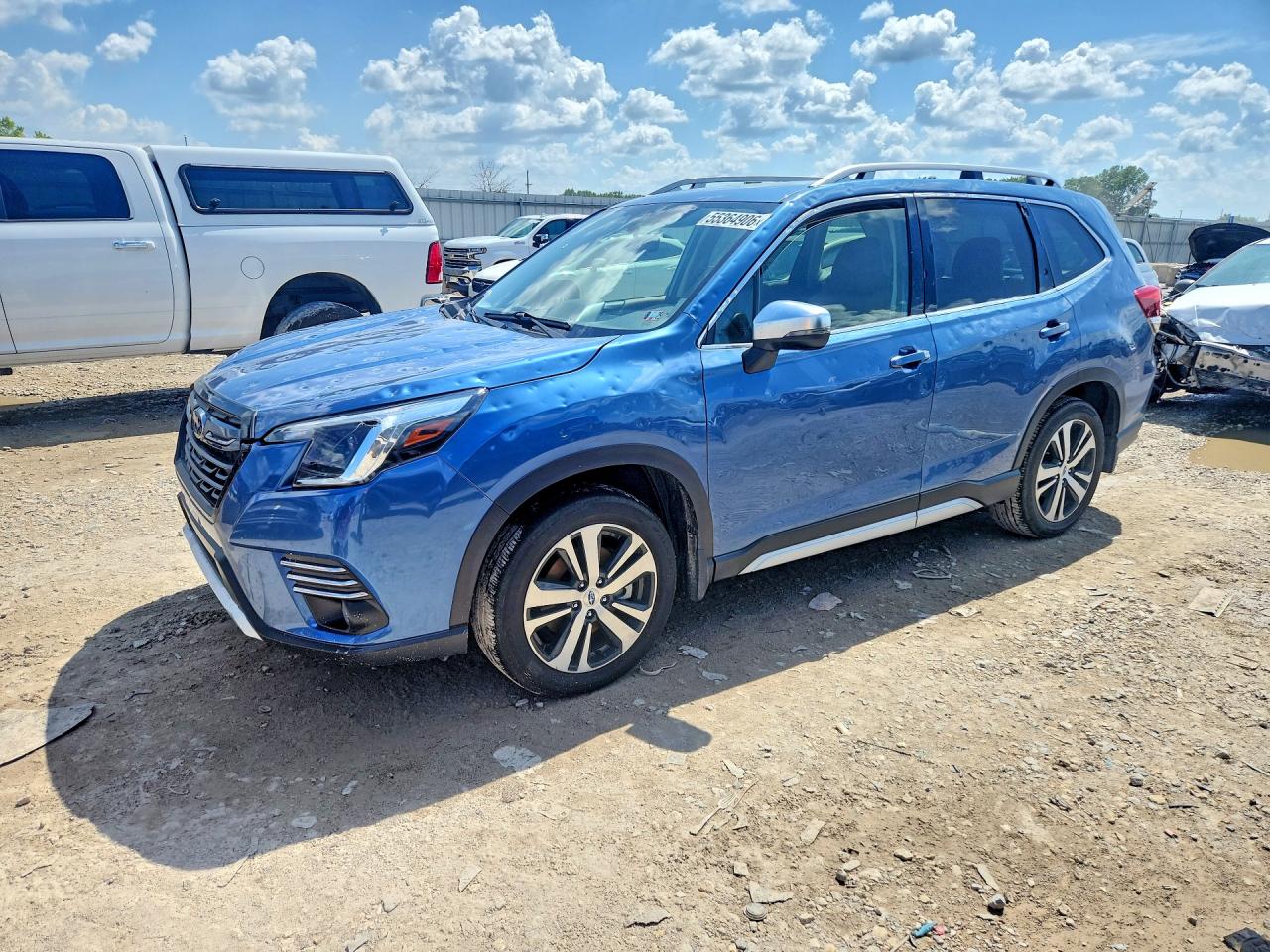 2022 Subaru Forester Touring, VIN JF2SKARC2NH483443 — Hail
