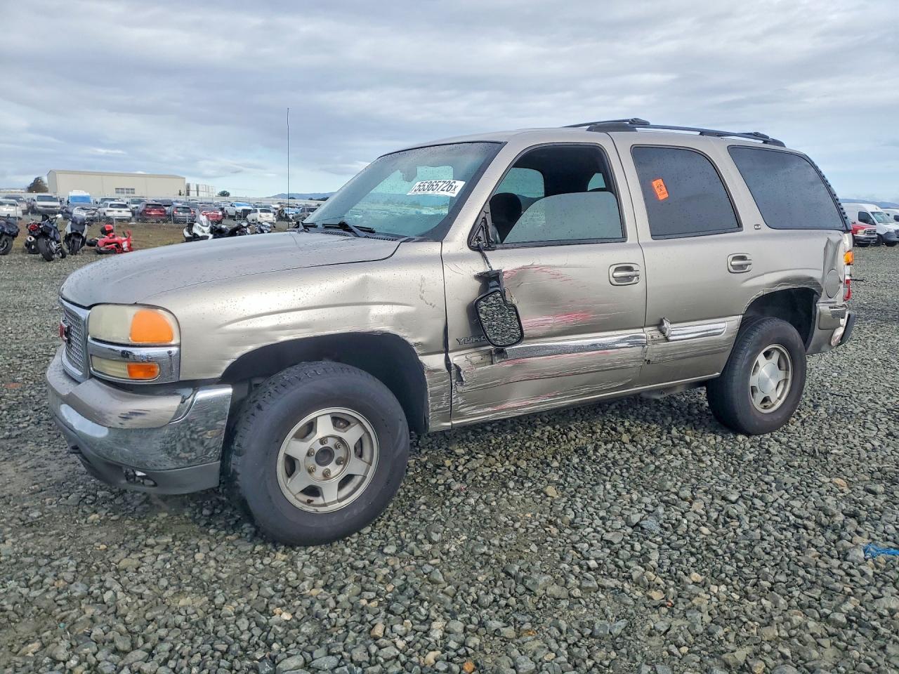 2002 GMC Yukon SLE, VIN 1GKEC13T12R223353 — Side