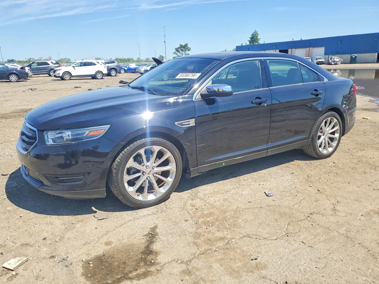 2019 Ford Taurus Limited, VIN 1FAHP2F8XKG110478 — Side