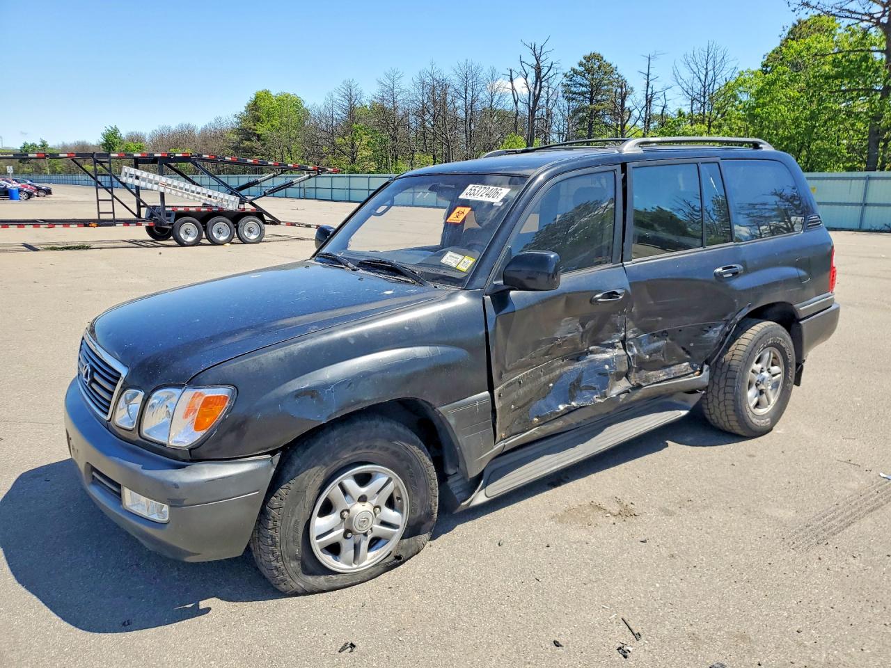 2000 Lexus LX 470, VIN JT6HT00W5Y0110561 — Side