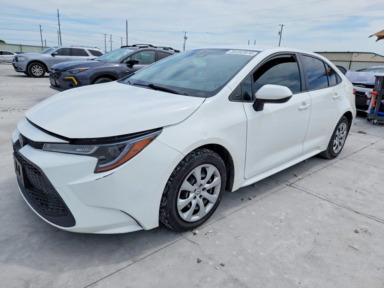 2022 Toyota Corolla LE, VIN JTDEPMAE9N3007439 — Град