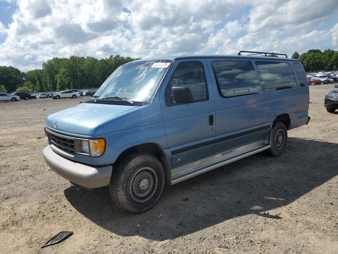1994 Ford Econoline Wagon Super Custom, VIN 1FBJS31H3RHB19765 — Side