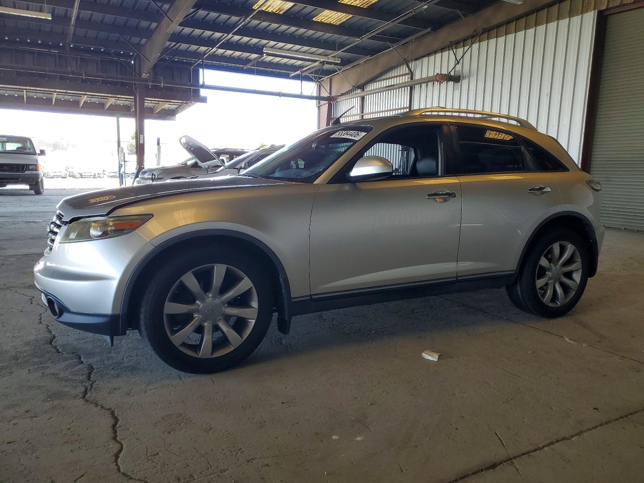 2005 Infiniti FX, VIN JNRBS08W55X402462 — Side