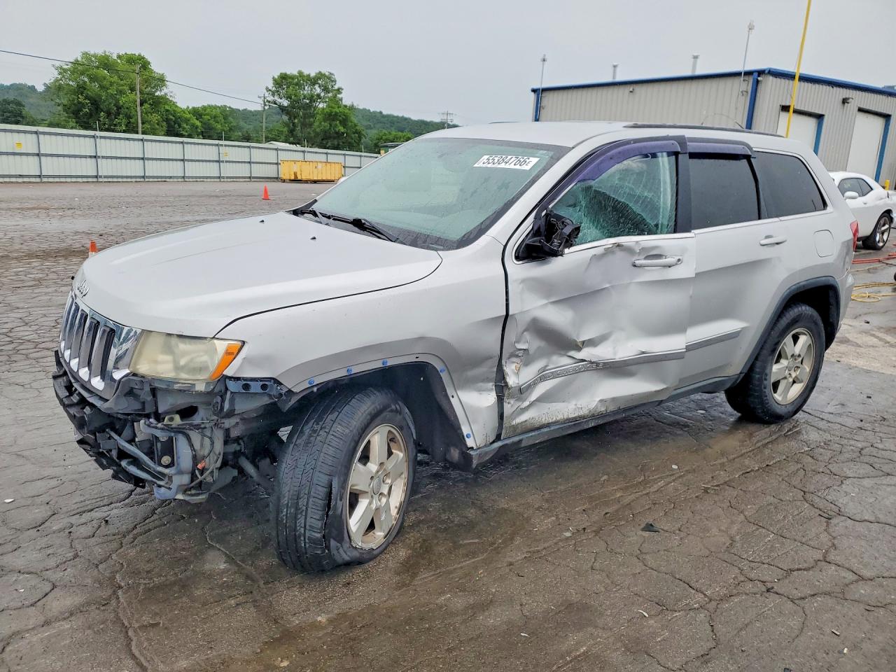 2013 Jeep Grand Cherokee Laredo, VIN 1C4RJEAG4DC507887 — Side