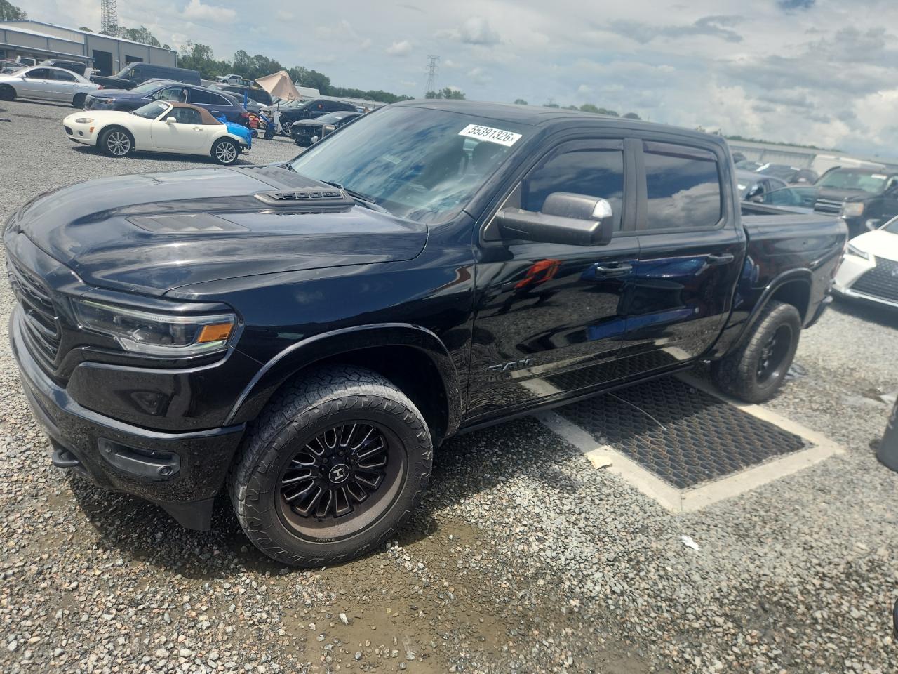 2020 Ram 1500 Limited, VIN 1C6SRFHT3LN371202 — Side