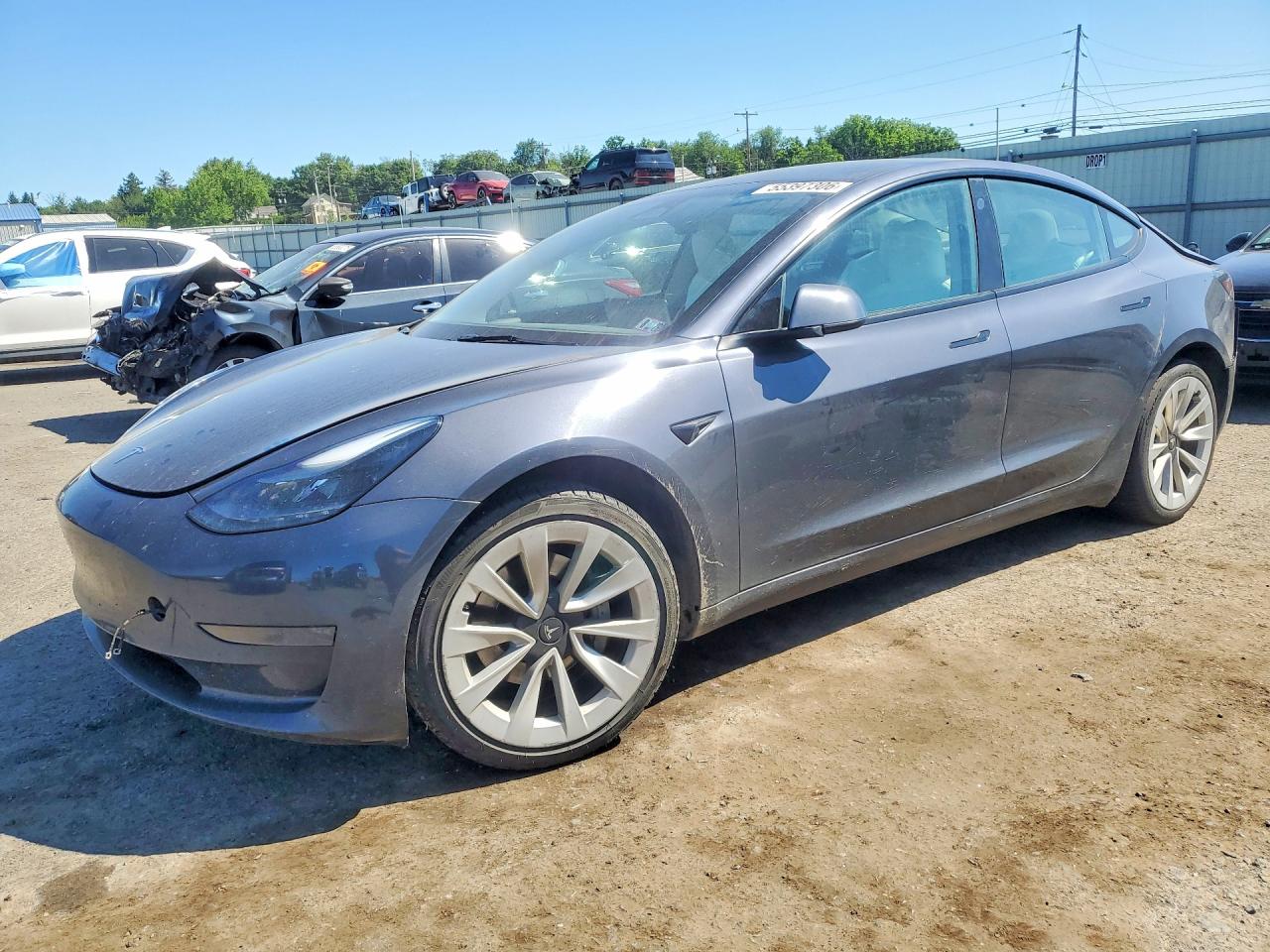 2023 Tesla Model 3, VIN 5YJ3E1EA0PF640761 — Rear end