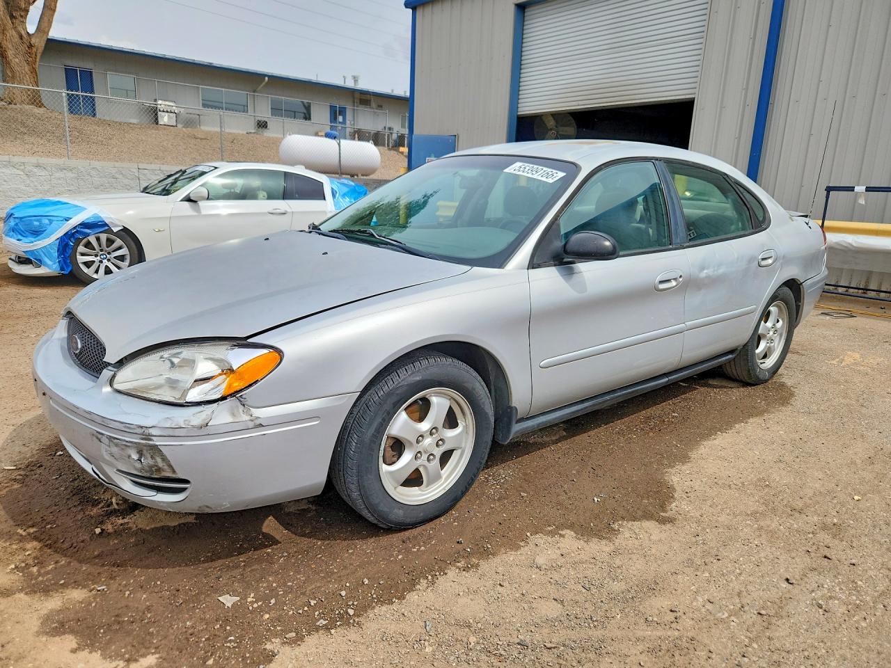 2005 Ford Taurus SE, VIN 1FAFP53235A108765 — Зад