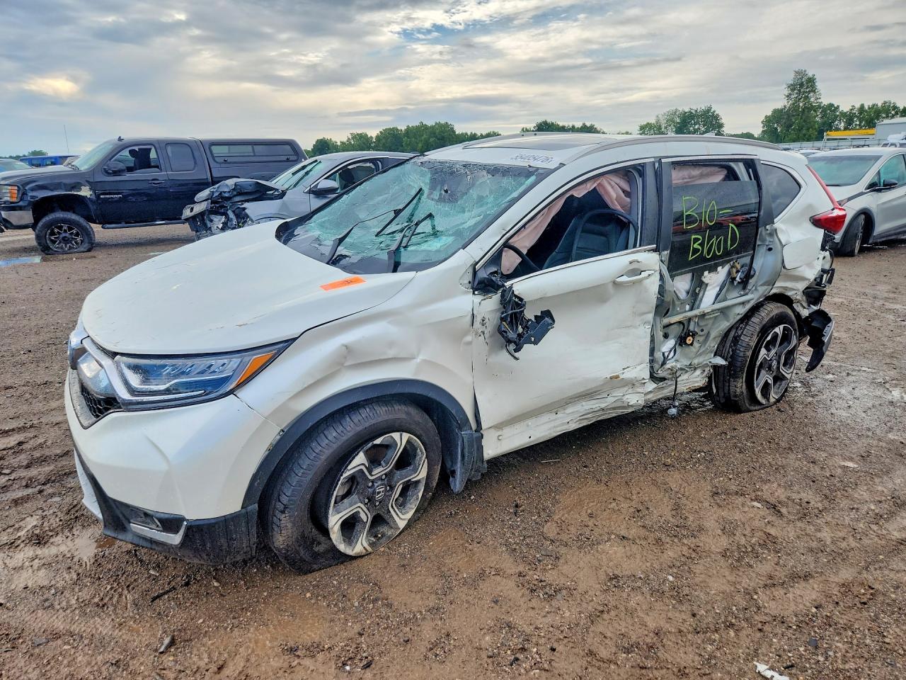 2018 Honda CR-V Touring, VIN 2HKRW2H90JH654344 — Rollover
