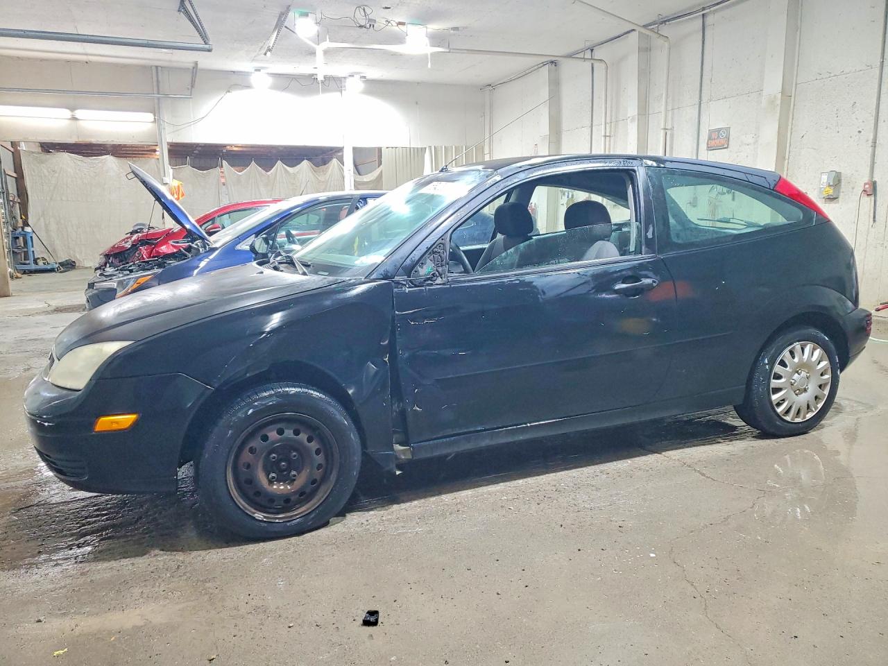 2006 Ford Focus S, VIN 1FAFP31N86W146983 — Side