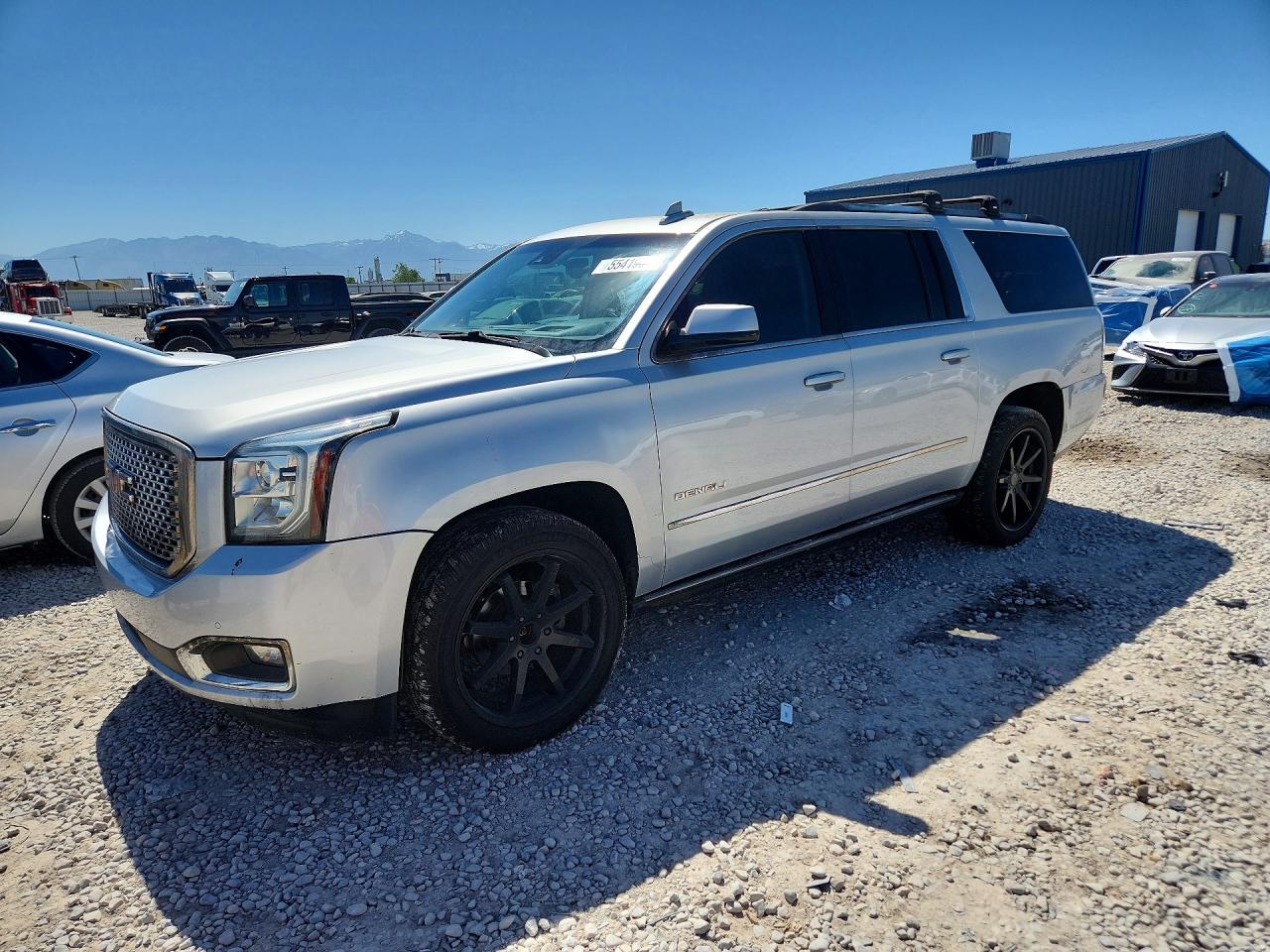 2016 GMC Yukon XL Denali, VIN 1GKS2HKJ0GR245463 — Burn