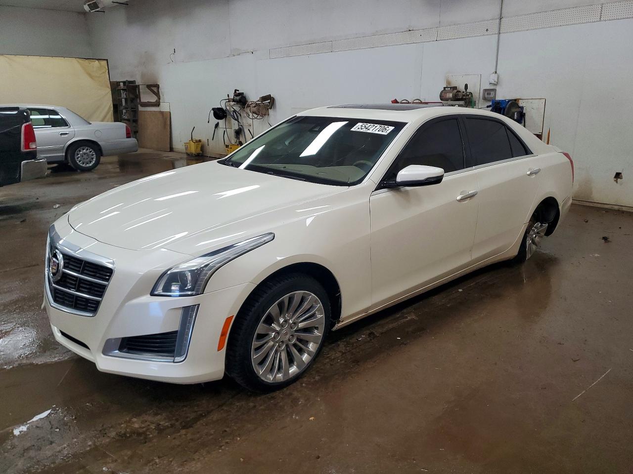 2014 Cadillac CTS Luxury AWD, VIN 1G6AX5S33E0175132 — Бок
