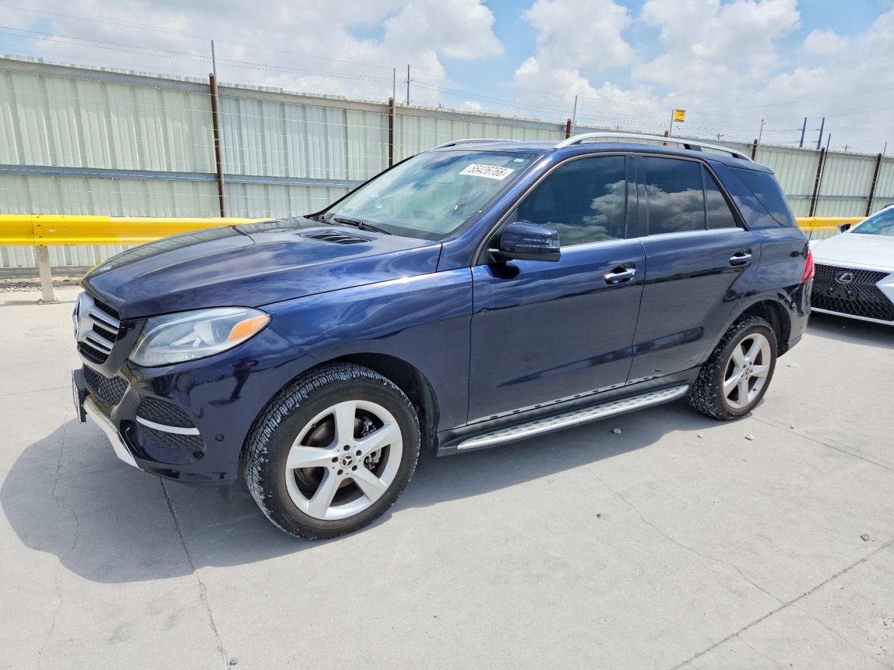 2018 Mercedes-Benz GLE 350, VIN 4JGDA5JB0JB201295 — Side