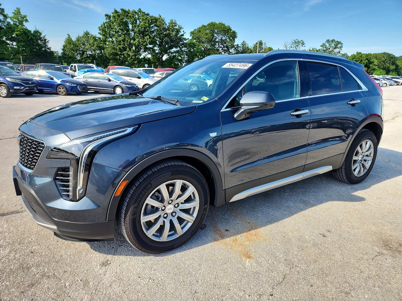 2020 Cadillac XT4 FWD Premium Luxury, VIN 1GYFZCR43LF126629 — Hail