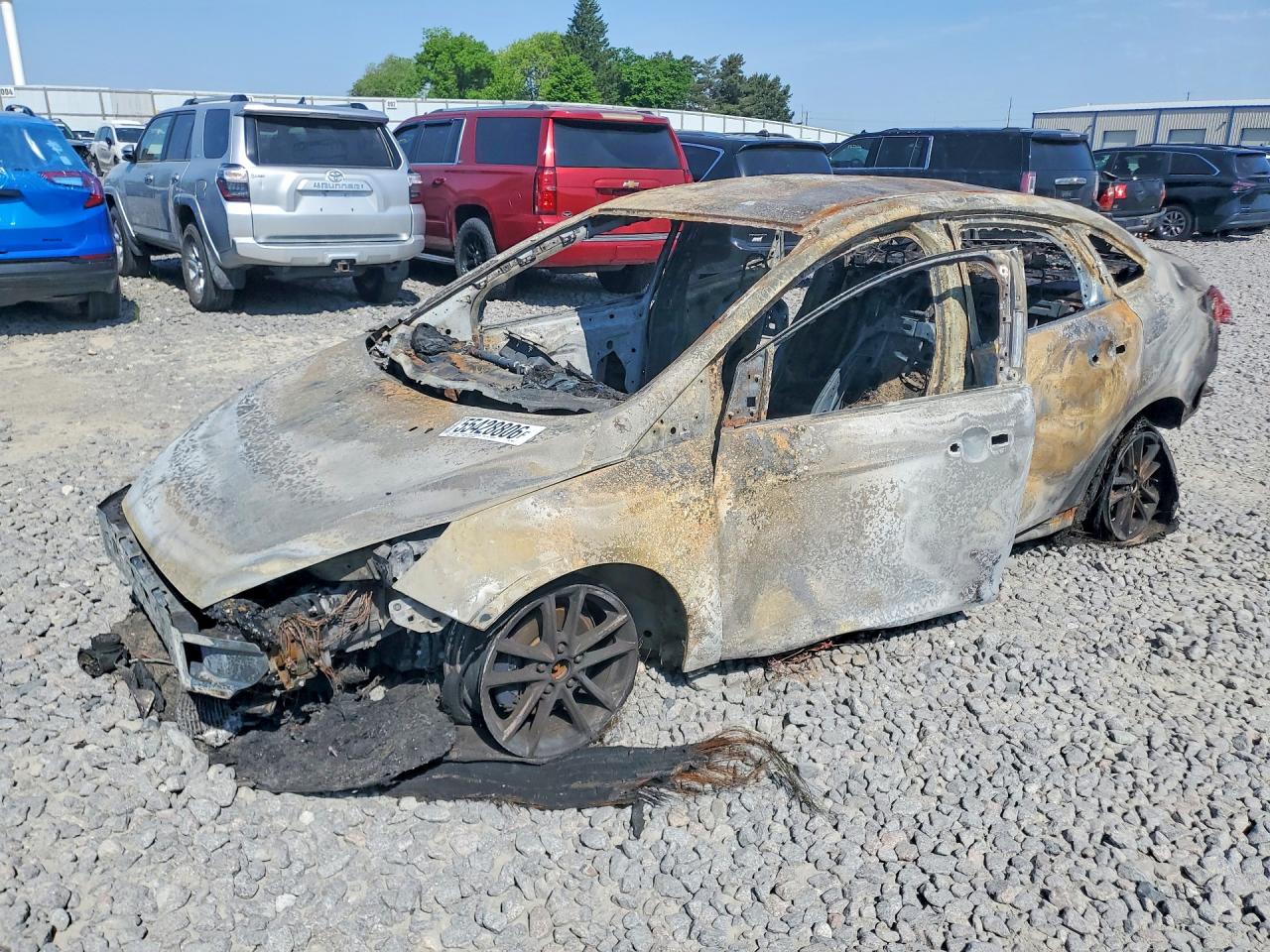 2016 Ford Focus SE, VIN 1FADP3F26GL310336 — Burn