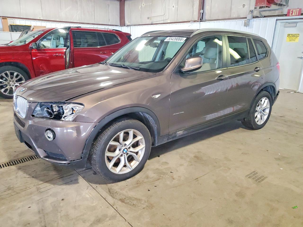 2012 BMW X3 28i, VIN 5UXWX5C52CL717009 — Град
