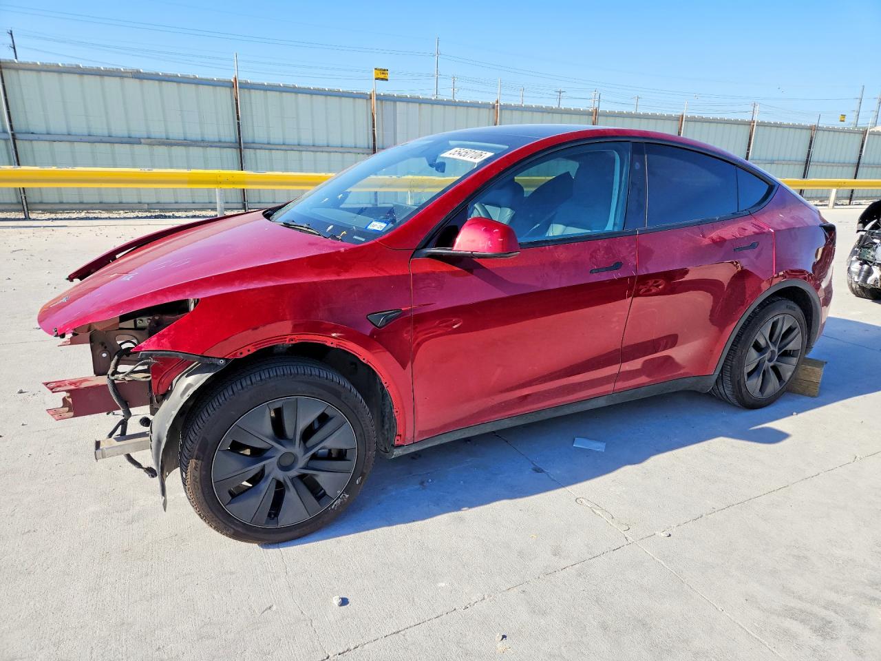 2024 Tesla Model Y, VIN 7SAYGDEDXRA319020 — Front end
