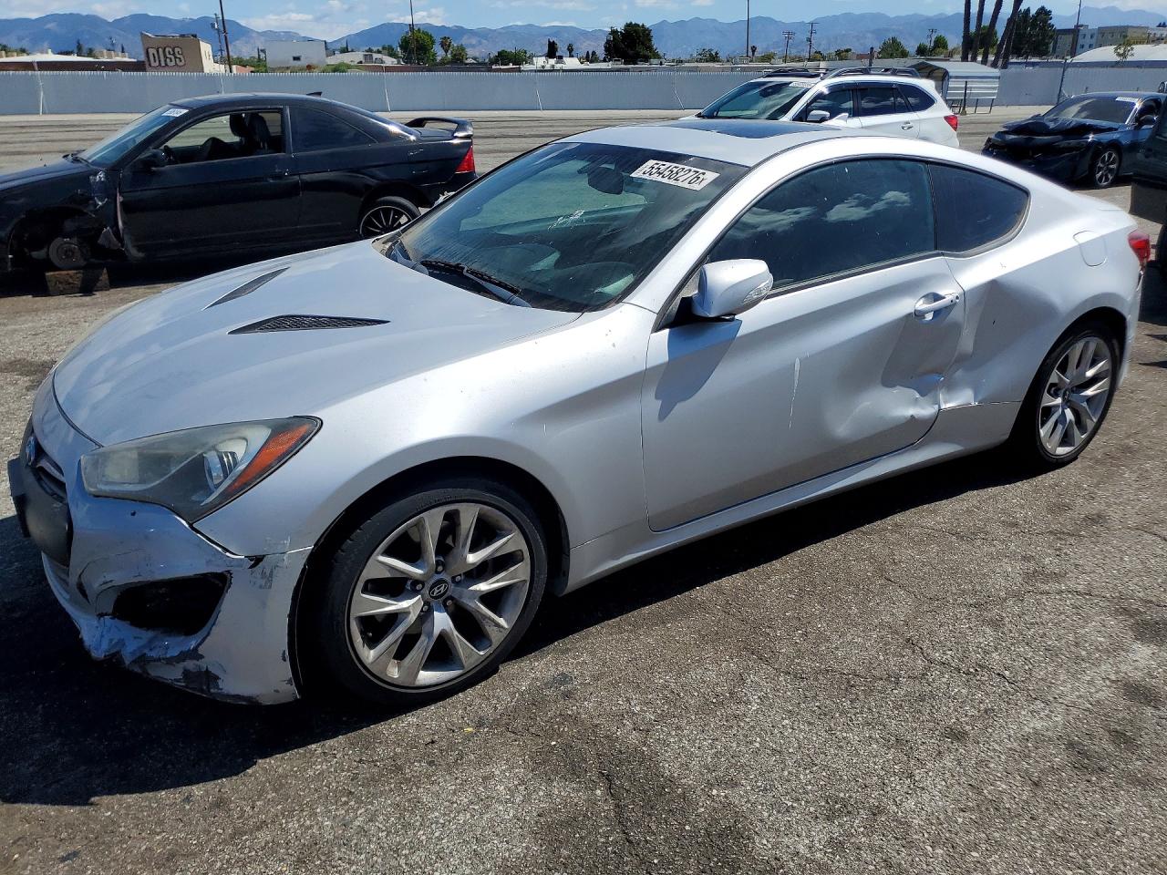 2014 Hyundai Genesis Coupe Ultimate, VIN KMHHU6KJ6EU114841 — Side