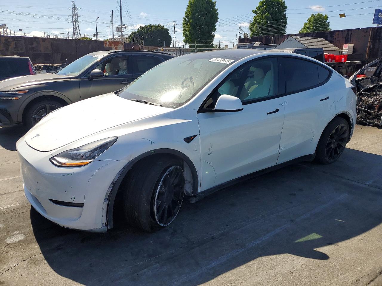 2022 Tesla Model Y Long Range, VIN 7SAYGDEE3NF340698 — Vandalism