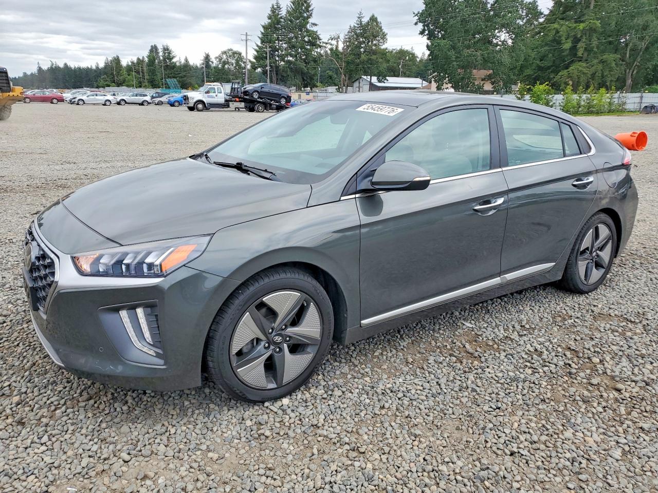 2021 Hyundai Ioniq Limited, VIN KMHC05LC3MU250360 — Side