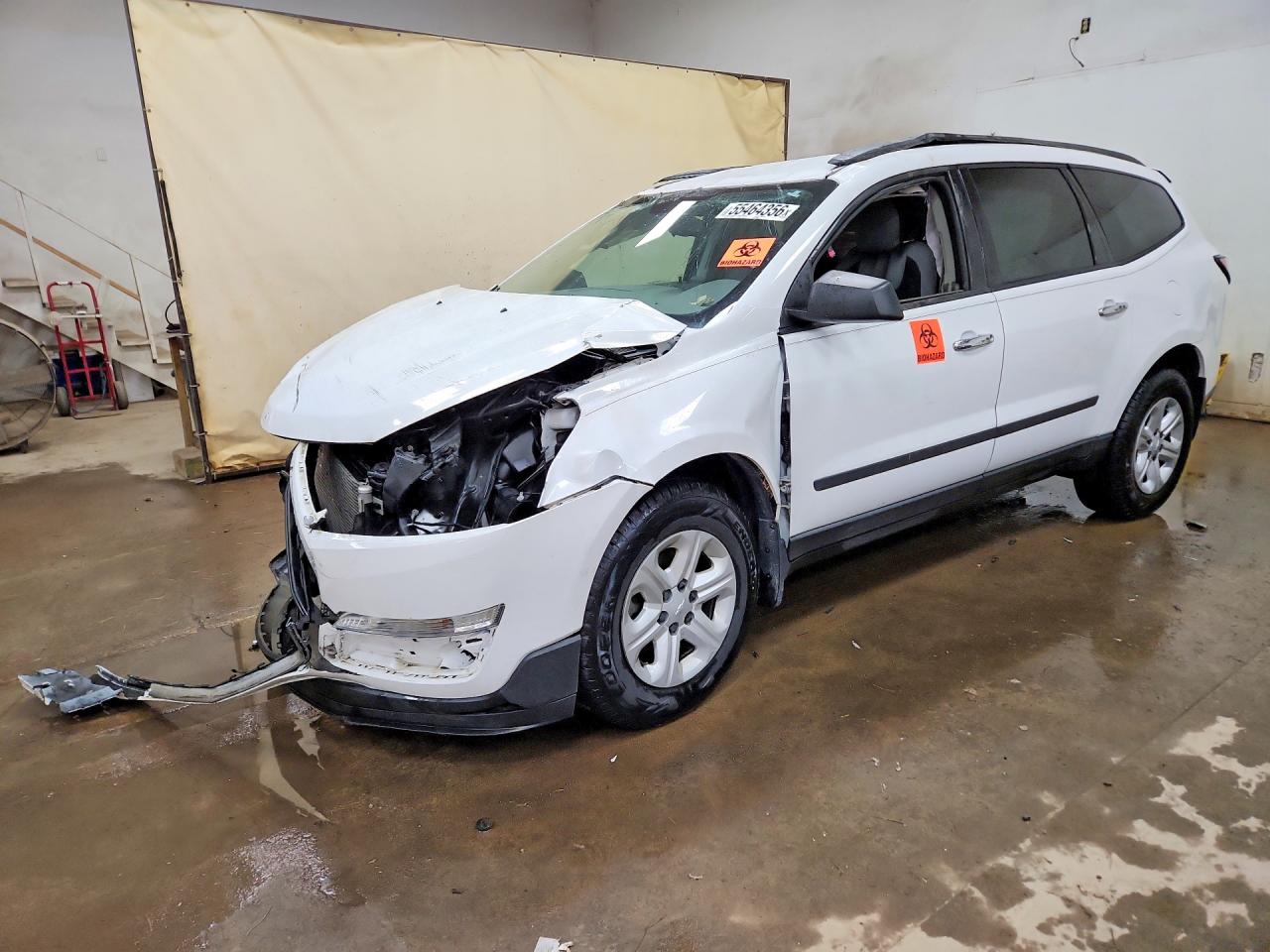 2016 Chevrolet Traverse LS, VIN 1GNKRFKD3GJ256467 — Опрокидывание