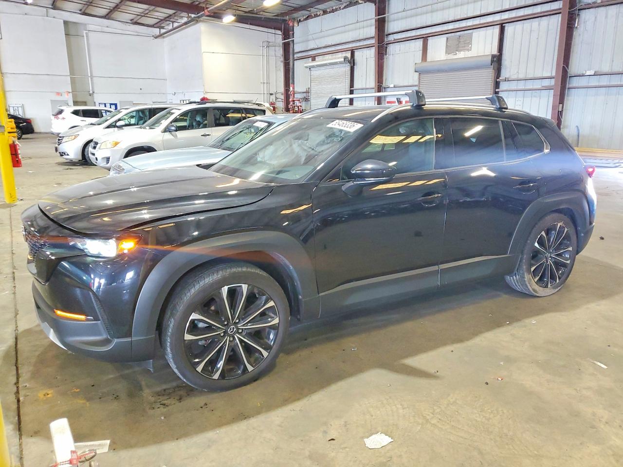2024 Mazda CX-50 Premium, VIN 7MMVABDY9RN165527 — Rear end