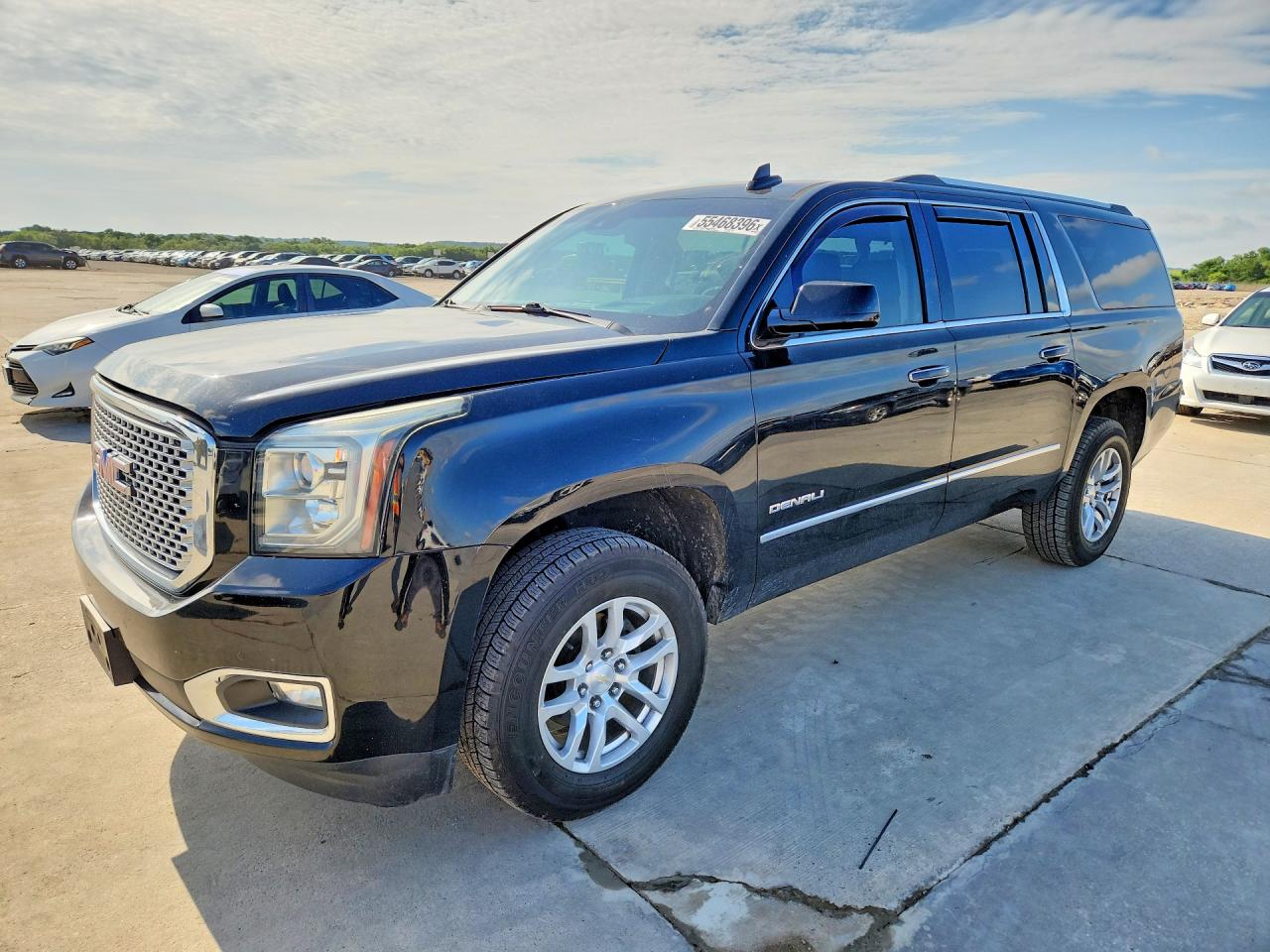 2016 GMC Yukon XL Denali, VIN 1GKS2HKJ4GR220775 — Hail