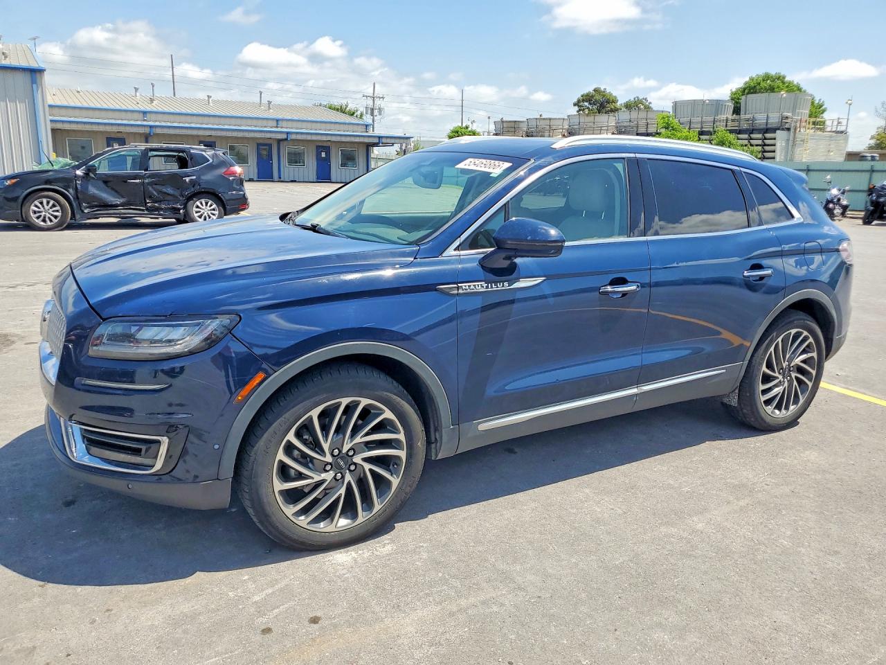 2019 Lincoln Nautilus Reserve, VIN 2LMPJ8LP8KBL37214 — Hail