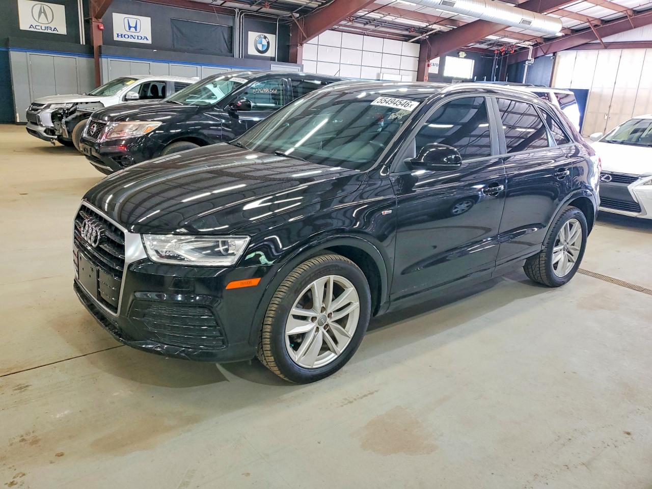 2018 Audi Q3 Premium, VIN WA1ECCFS6JR027170 — Minor dents and scratches