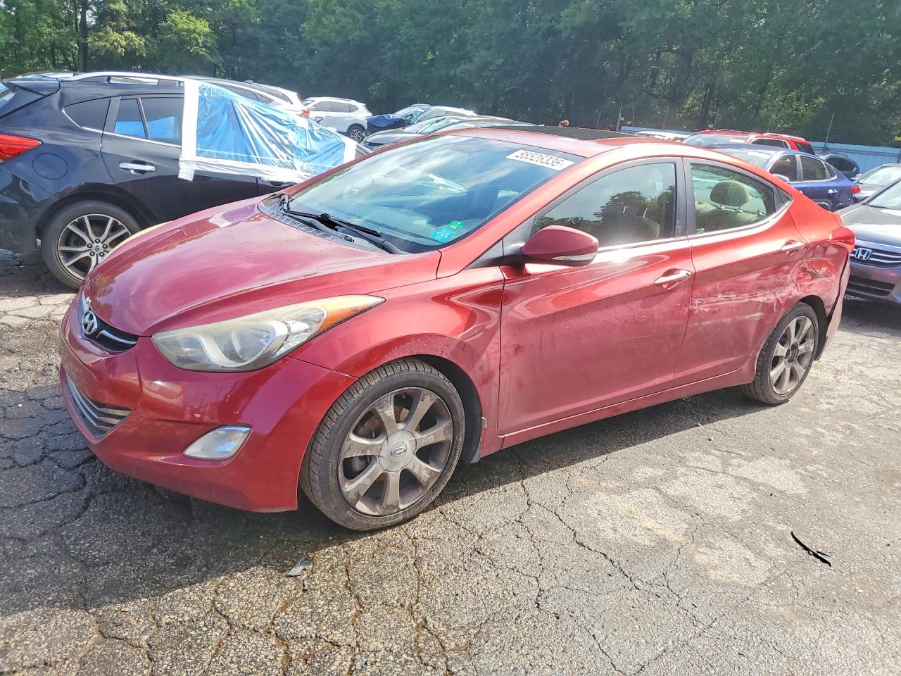 2013 Hyundai Elantra GLS, VIN 5NPDH4AE9DH243083 — Side
