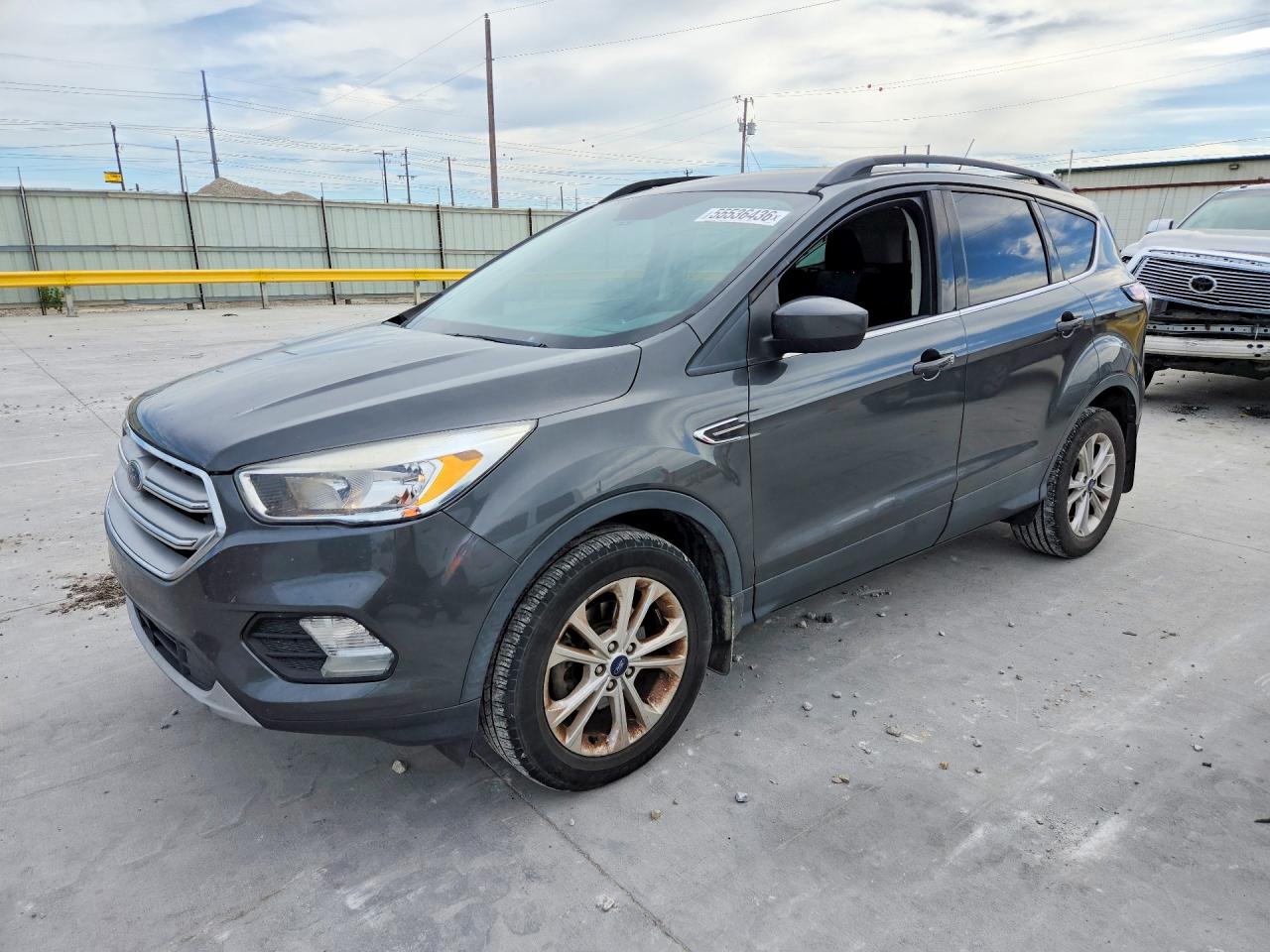 2018 Ford Escape SE, VIN 1FMCU0GD7JUC54630 — Hail