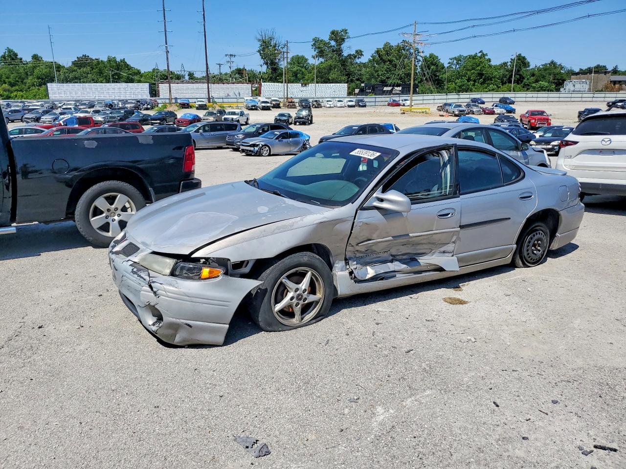 2000 Pontiac Grand Prix GT, VIN 1G2WP52K4YF308786 — Side