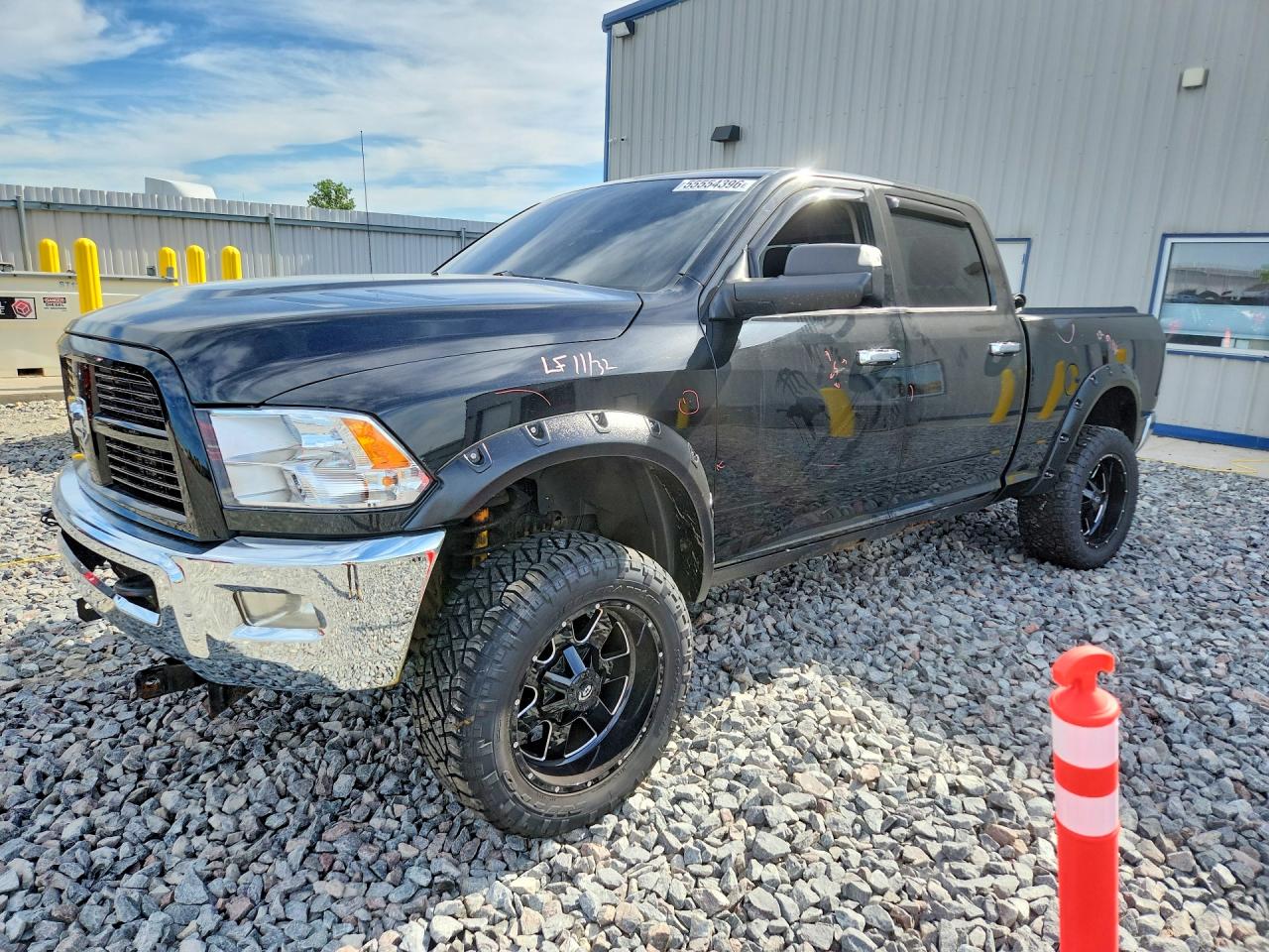 2012 Ram 2500 SLT, VIN 3C6UD5DL2CG337364 — Side
