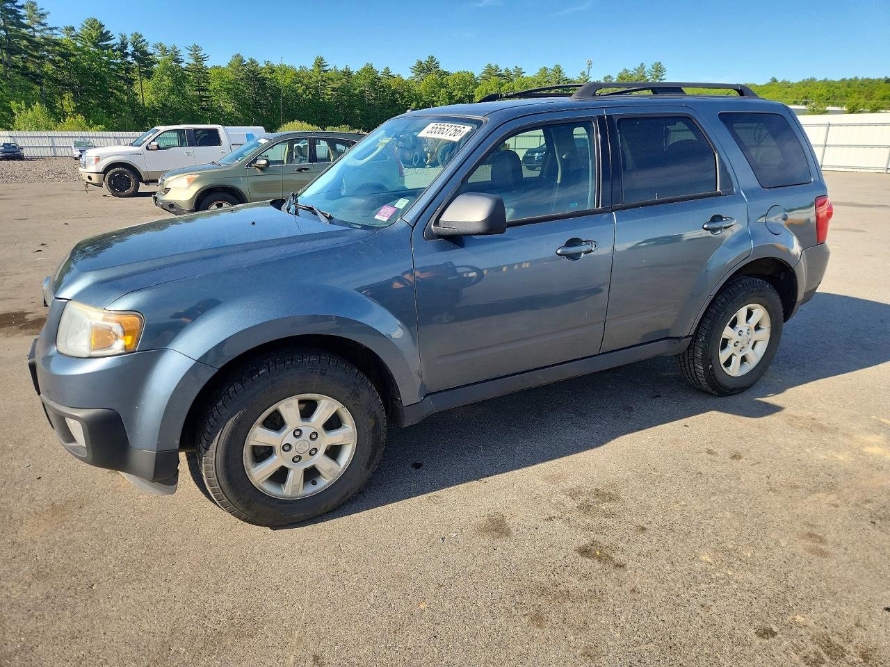 2011 Mazda Tribute Grand Touring, VIN 4F2CY9GGXBKM03200 — Normal wear