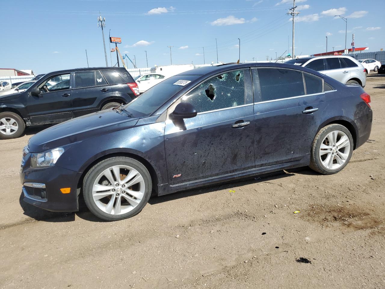 2016 Chevrolet Cruze LTZ, VIN 1G1PG5SBXG7174450 — Hail