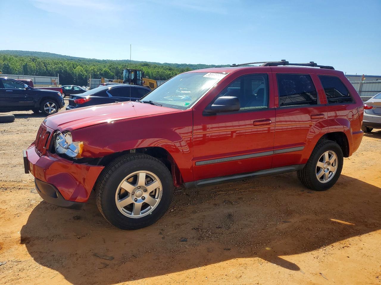 2009 Jeep Grand Cherokee Laredo, VIN 1J8GS48K49C542471 — Front end
