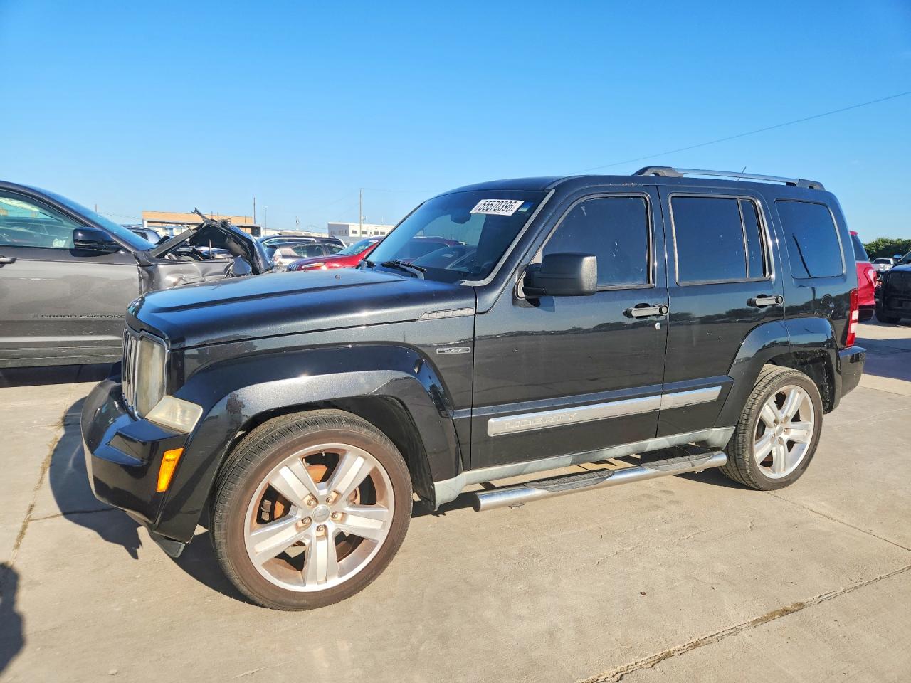 2012 Jeep Liberty Limited Jet, VIN 1C4PJLFK8CW123651 — Зад