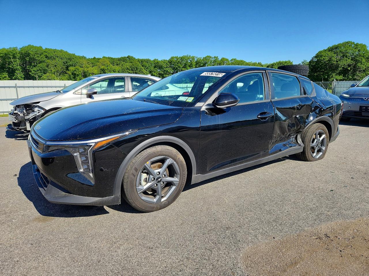 2026 Kia K4 LXS, VIN 3KPFT4DE6TE286074 — Side