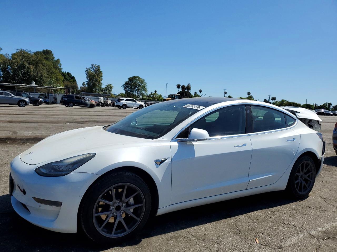 2019 Tesla Model 3 Mid Range, VIN 5YJ3E1EA2KF482450 — Rear end