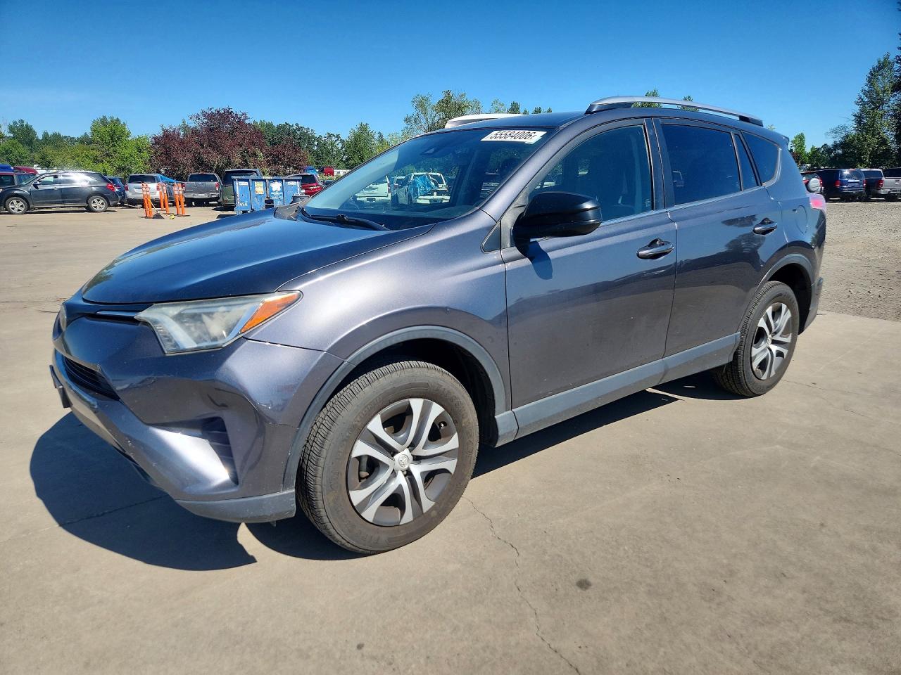 2017 Toyota RAV4 LE, VIN JTMZFREVXHJ710060 — Side