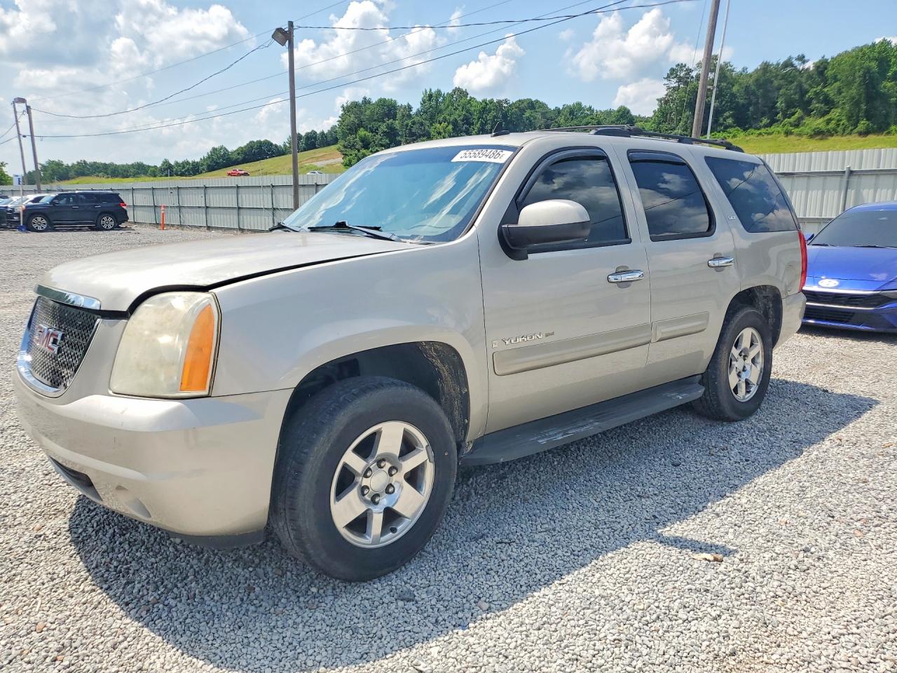 2009 GMC Yukon SLT 4SA, VIN 1GKEC33329R213713 — Side