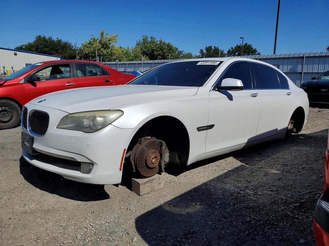2011 BMW 7 Series 740Li, VIN WBAKB4C52BC574261 — Vandalism
