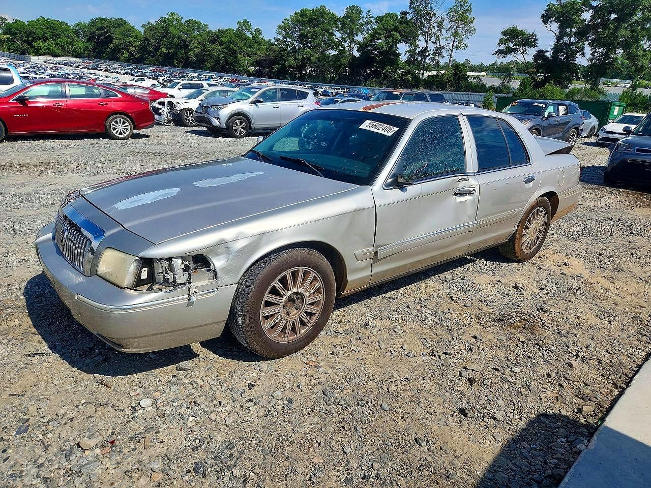 2008 Mercury Grand Marquis LS, VIN 2MEFM75V58X661451 — Side