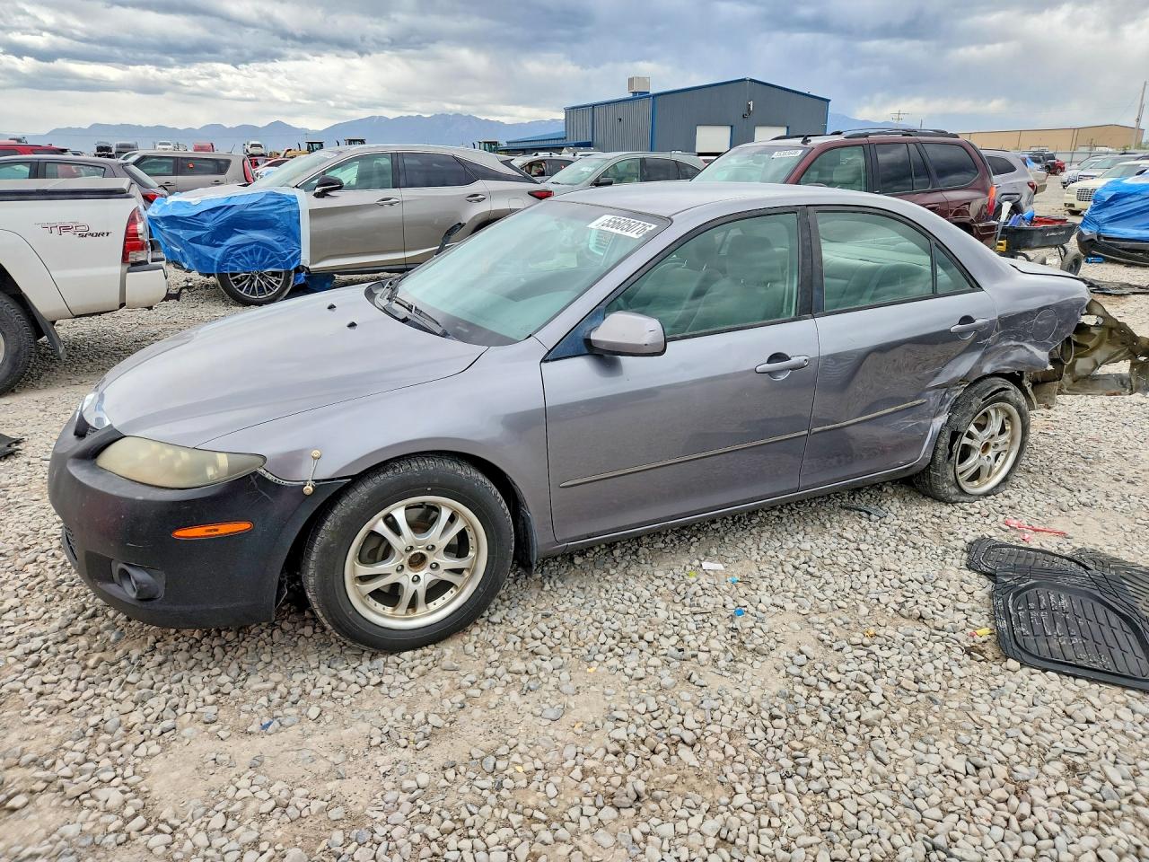2007 Mazda 6 i Sport, VIN 1YVHP80CX75M24378 — Side