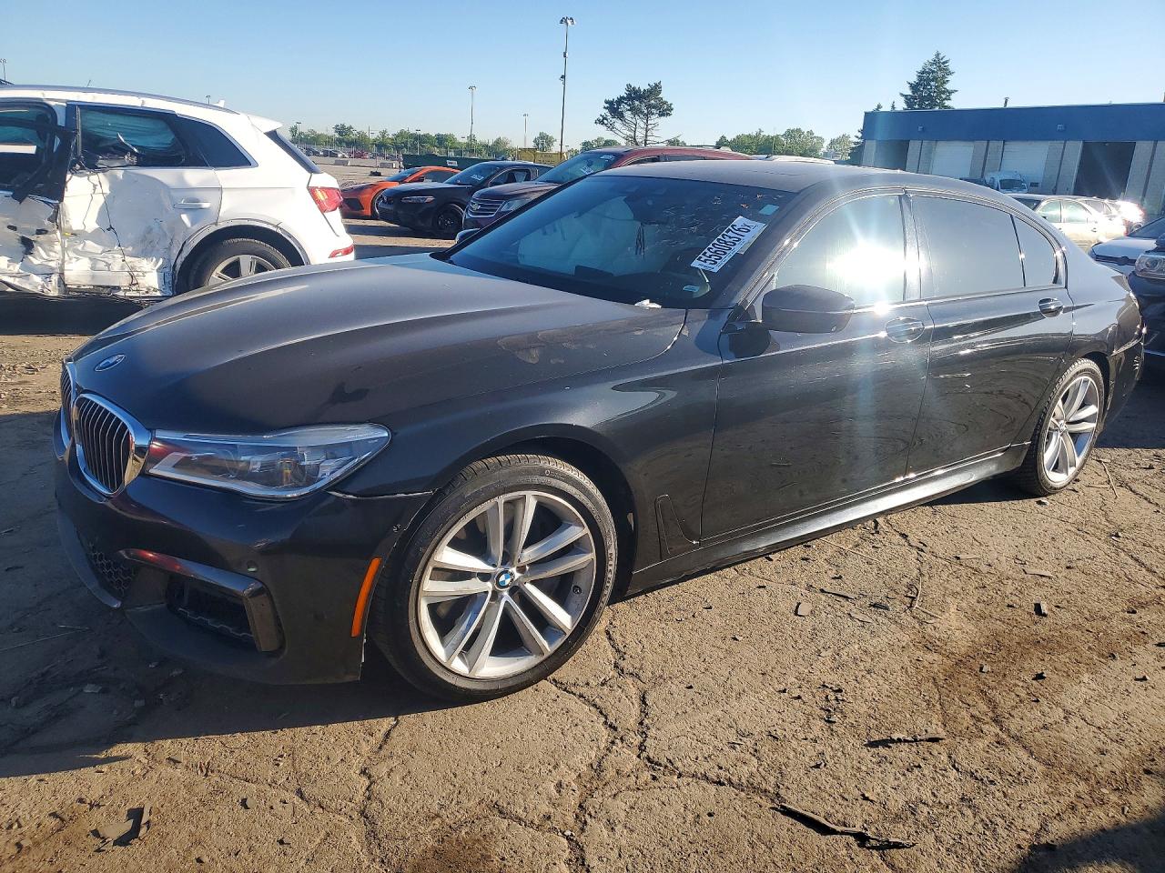 2016 BMW 7 Series 750i xDrive, VIN WBA7F2C59GG419706 — Side