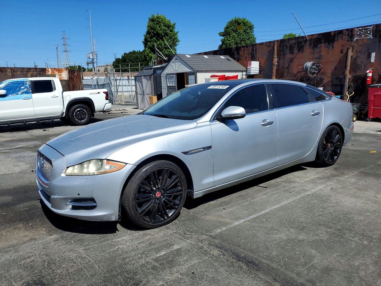 2014 Jaguar XJ Portfolio, VIN SAJWA2GZXE8V65468 — Мелкие вмятины и царапины