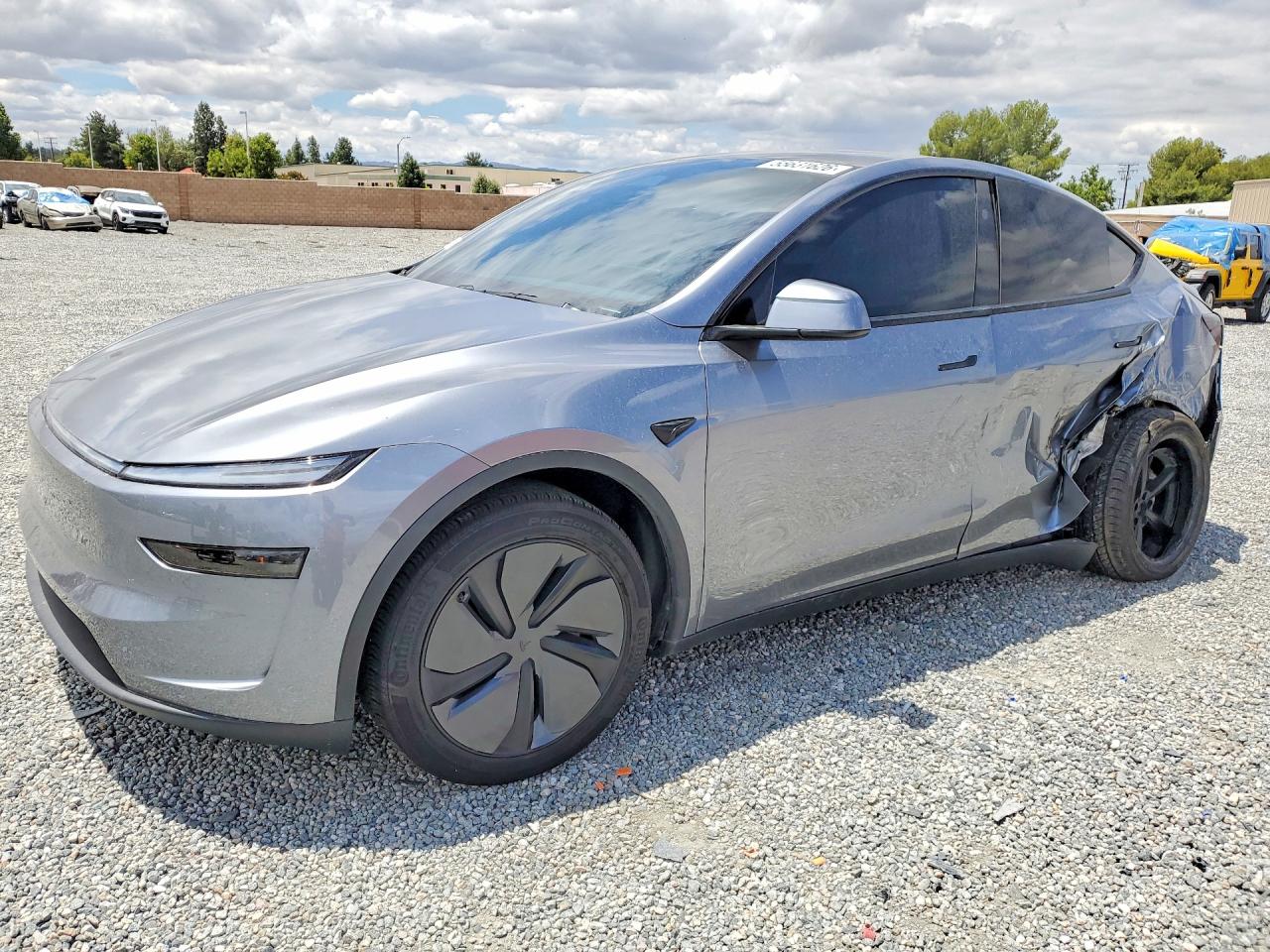 2026 Tesla Model Y Long Range, VIN 7SAYGDED4TF414585 — Side